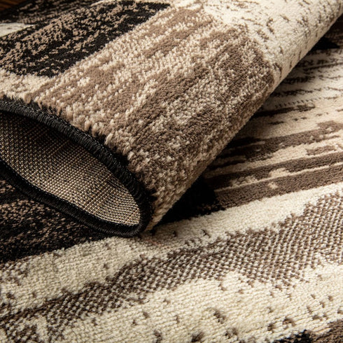 12' Black Brown And Beige Patchwork Runner Rug